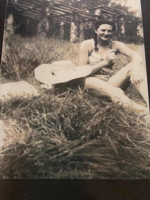 Black and white picture of colleens mum having a picnic in the tall grass Black and white picture of colleens mum having a picnic in the tall grass