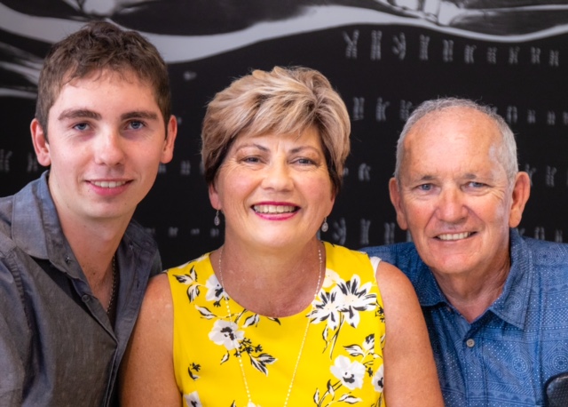 Picture of Colleen and her son and husband. Picture of Colleen and her son and husband.